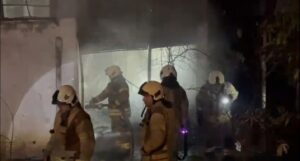 Turgut Reis Mahallesi’nde bir binanın giriş katındaki boya kaporta dükkanında